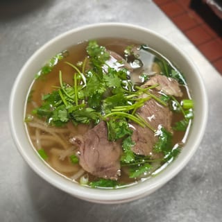 P 9 Pho Well-done , flank, and tripe (Chin, Nam, Sach